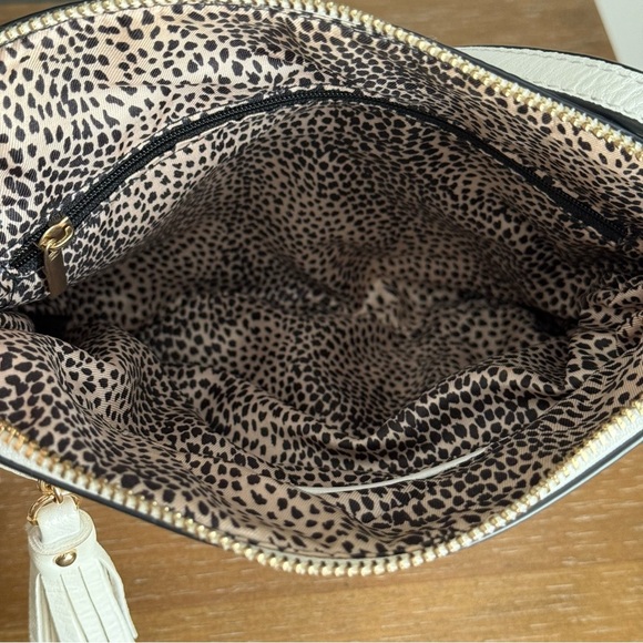 White Chevron Quilted Medium Crossbody Bag with Tassel Accent - Picture 8 of 11